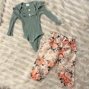 Ribbed green long sleeve onesie with ruffles and paper bag bow floral pants